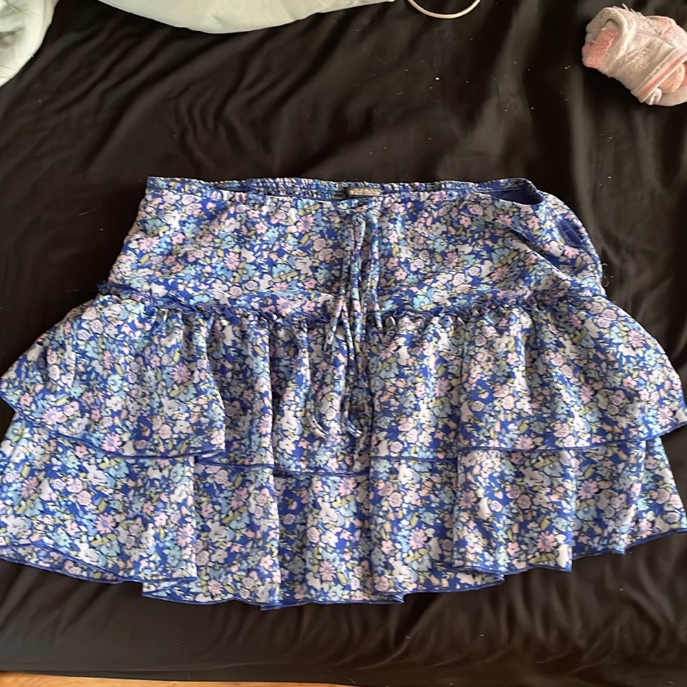 This is a skirt it’s a floral blue skirt size medium